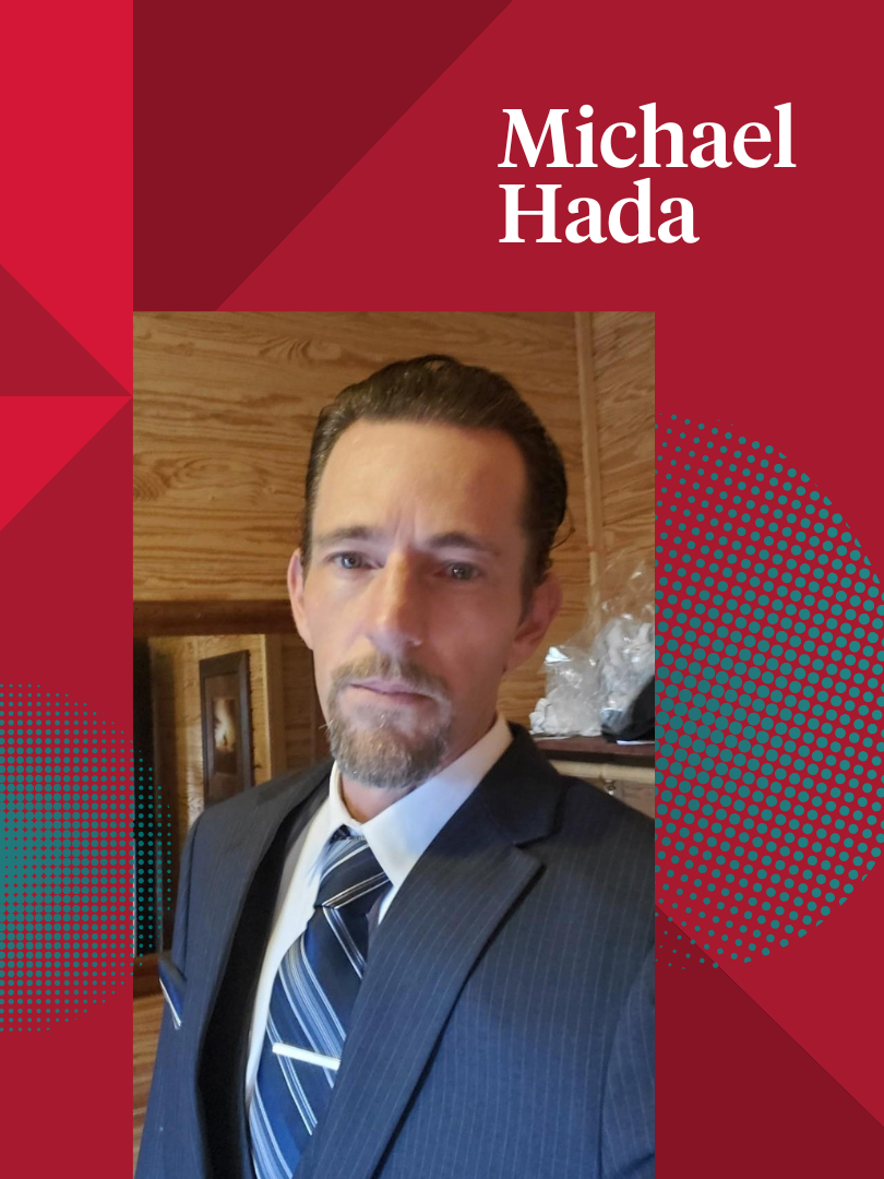 Michael Hada on a red graphic of shapes